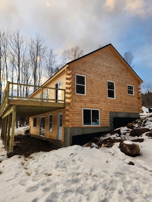 J. L. Adler Carpentry - Log Sided Home